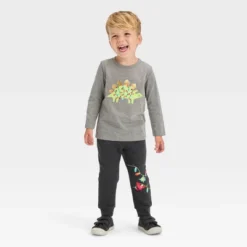 Toddler Boys' 2pc Long Sleeve Graphic T-Shirt And Fleece Jogger Pants Set - Cat & Jack™ Charcoal Gray 7 Toddler Boys' 2pc Long Sleeve Graphic T-Shirt And Fleece Jogger Pants Set - Cat & Jack™ Charcoal Gray -Kid Clothing GUEST 0f44e20e ee7d 4713 ba04 eb2cb4a8b7c8