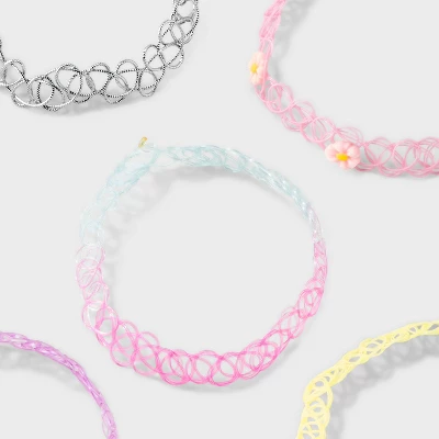 Girls' 5pk Tattoo Choker Necklace Set - Cat & Jack™: Pull-On Closure, 4 Inch Extender, Acrylic Material, 11 Inch Length 4 Girls' 5pk Tattoo Choker Necklace Set - Cat & Jack™: Pull-On Closure, 4 Inch Extender, Acrylic Material, 11 Inch Length - Image 2