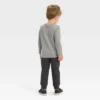 Toddler Boys' 2pc Long Sleeve Graphic T-Shirt And Fleece Jogger Pants Set - Cat & Jack™ Charcoal Gray 2 Toddler Boys' 2pc Long Sleeve Graphic T-Shirt And Fleece Jogger Pants Set - Cat & Jack™ Charcoal Gray -Kid Clothing GUEST ed09733a b412 409a be6c bf51ccdb8aea